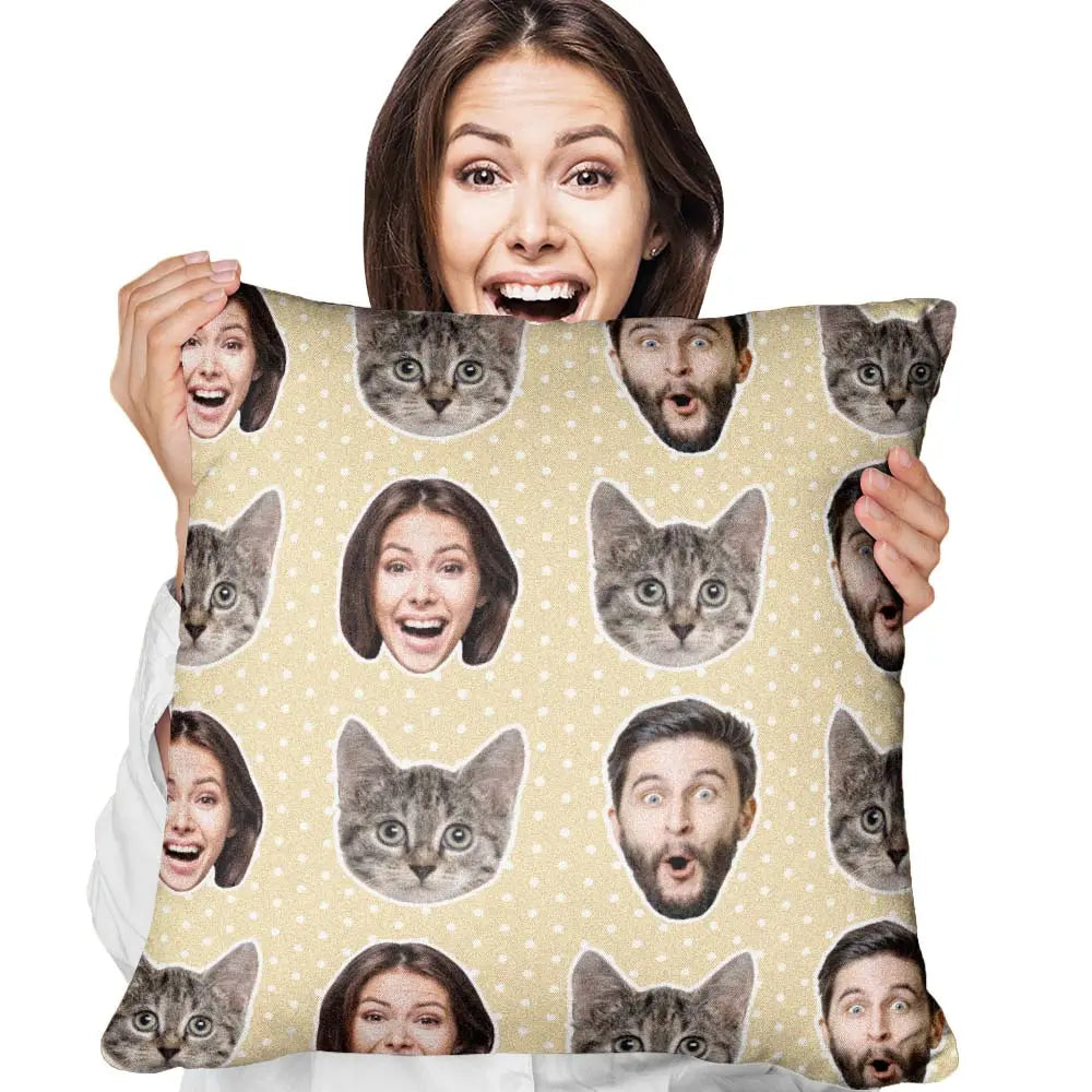 Person holding a pillow with cat and human face pattern