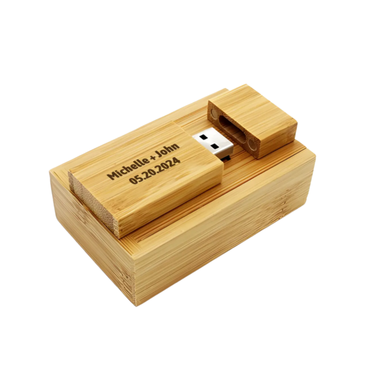 Wooden USB drive with engraved text on a white background