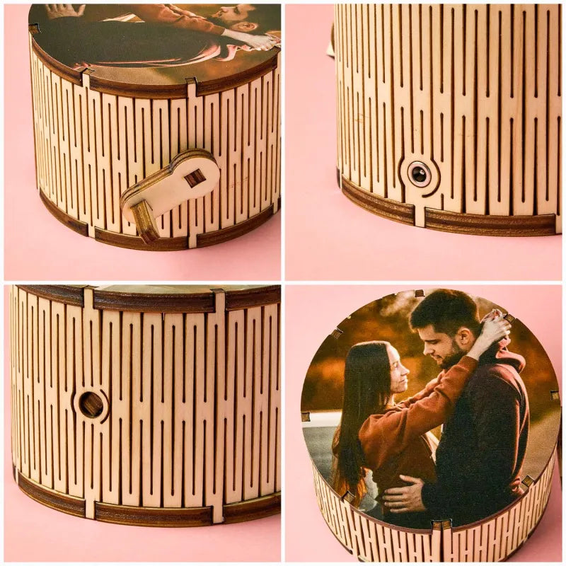 Wooden cylindrical photo album with a couple on a pink background