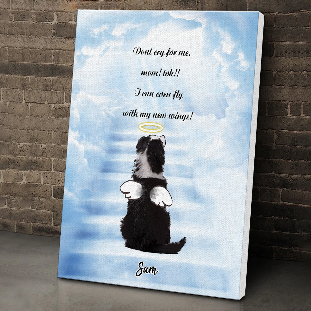 Canvas print with a dog illustration, angel wings, and a quote against a cloudy sky background.