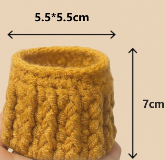 Yellow knitted product with dimensions labeled on a beige background