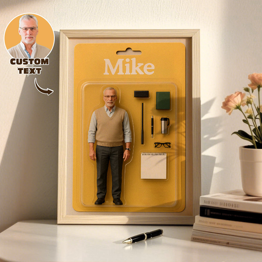 Model figure of a man in a packaging display with 'Mike' text, placed on a surface with books and flowers.