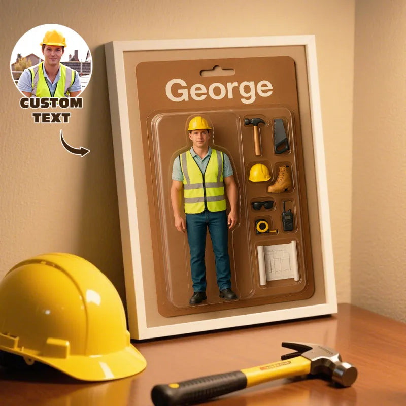 Figurine packaging labeled 'George' with construction-themed accessories on a wooden surface.
