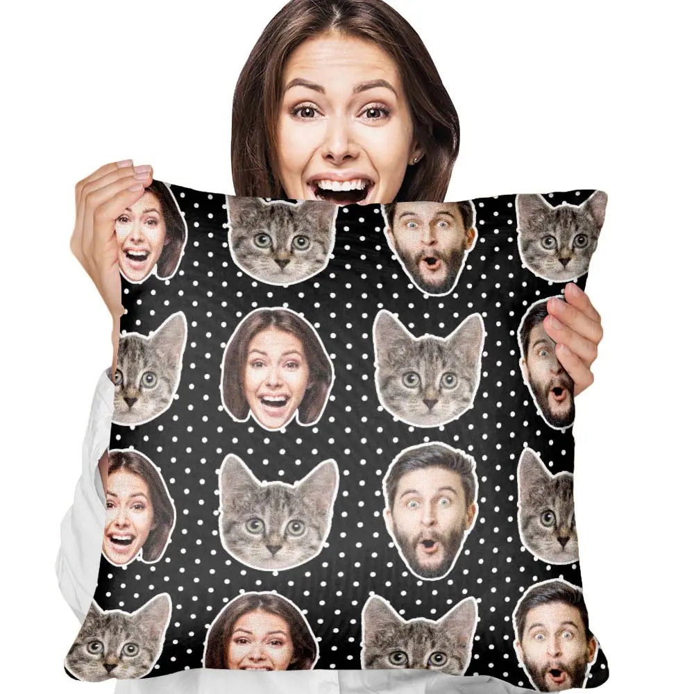 Person holding a blanket with cat and human face pattern on a polka dot background