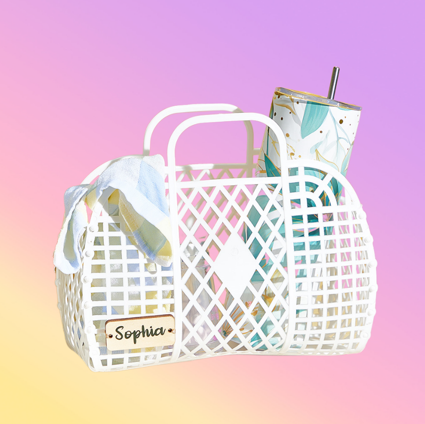 White woven basket with a straw and colorful item on a gradient background