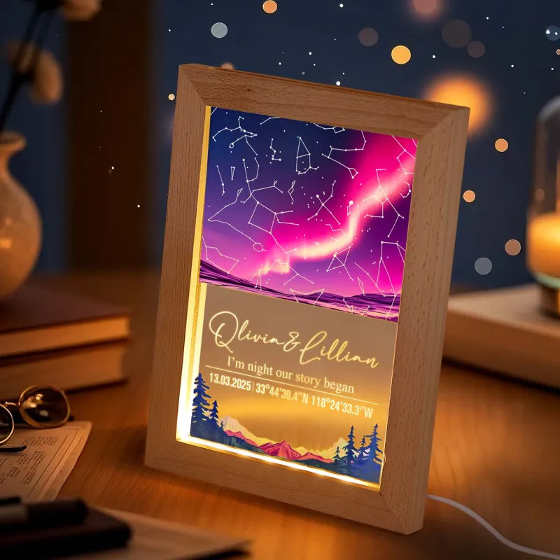 Decorative LED sign with constellation design and personalized text on a wooden frame.