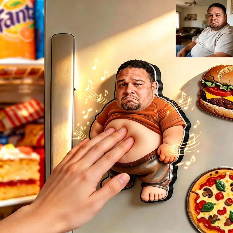 Fridge magnet of a cartoonish man being touched by a hand, with a refrigerator and snacks in the background.