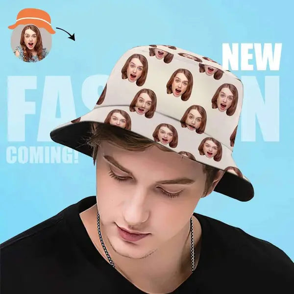 Person wearing a hat with printed faces on a blue background with promotional text.
