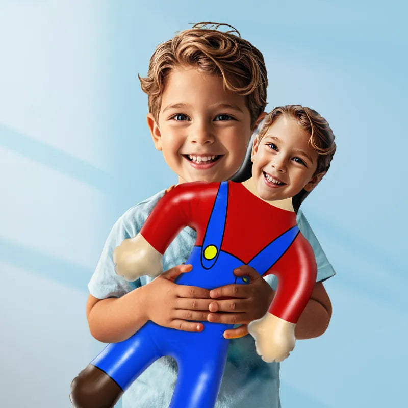 Two children holding a large inflatable blue and red toy against a light blue background