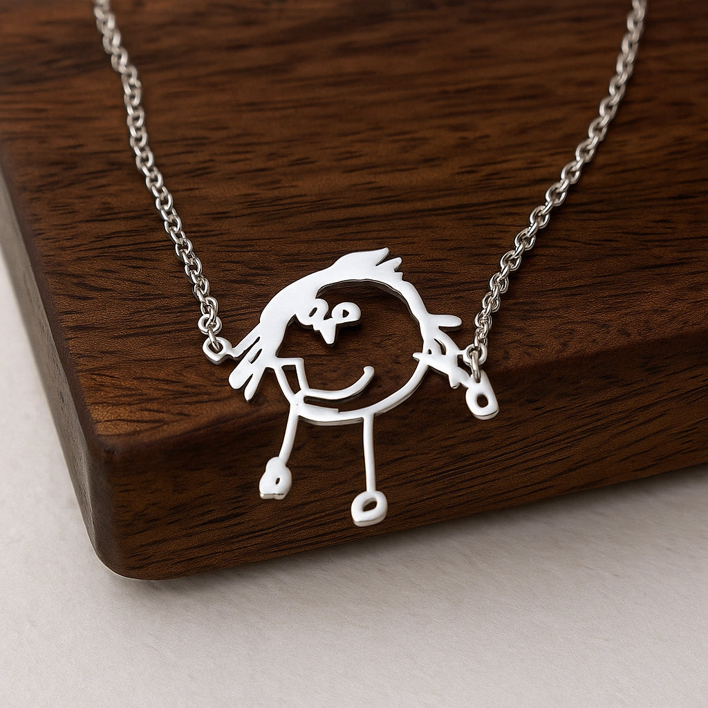 Silver necklace with a unique pendant on a wooden surface