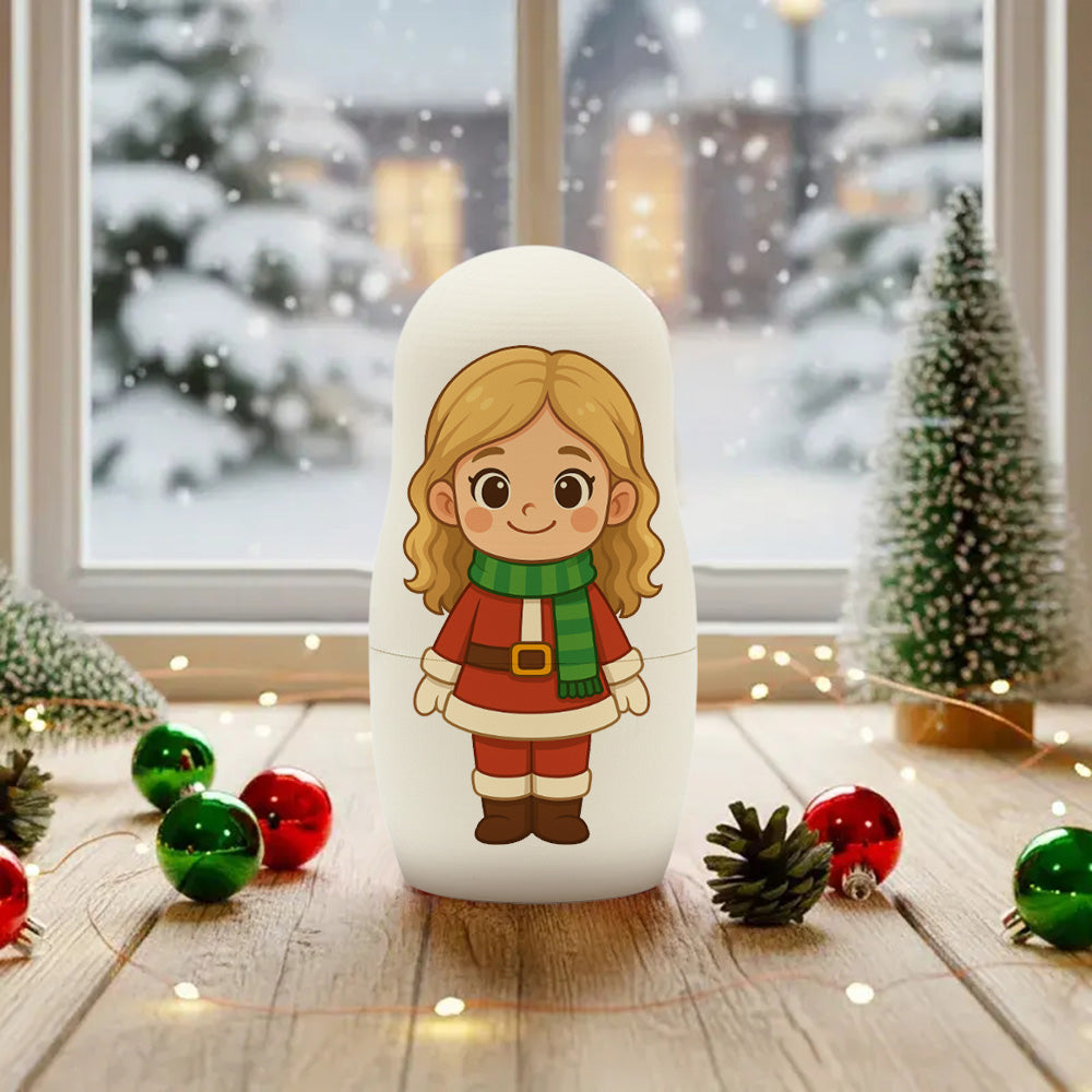 White mug with a cartoon character design on a wooden surface with Christmas decorations.