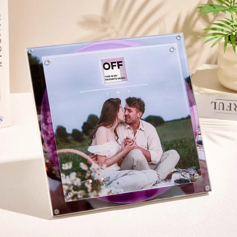 Glass photo plaque with a couple on a blanket in a field, featuring a 'OFF' button graphic.