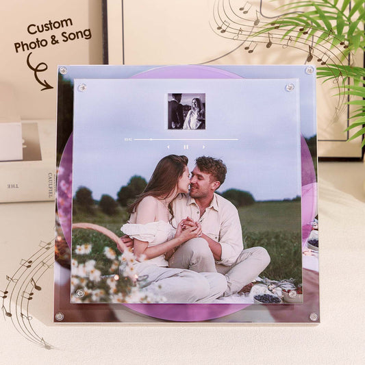 Personalized photo and song plaque with a couple in a field and music notes around.