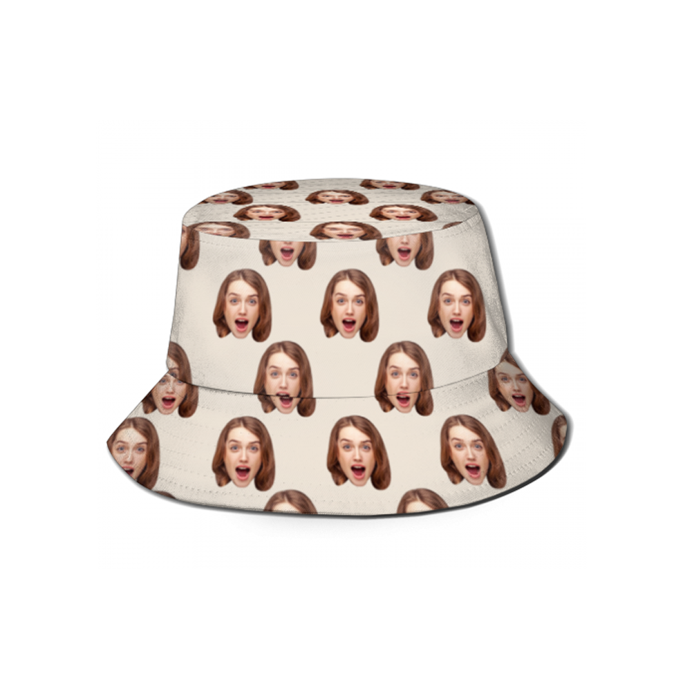 Bucket hat with a pattern of a person's face on a white background