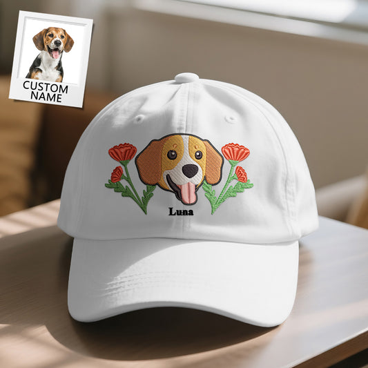 White cap with embroidered dog design and flowers, featuring the name 'Luna'.