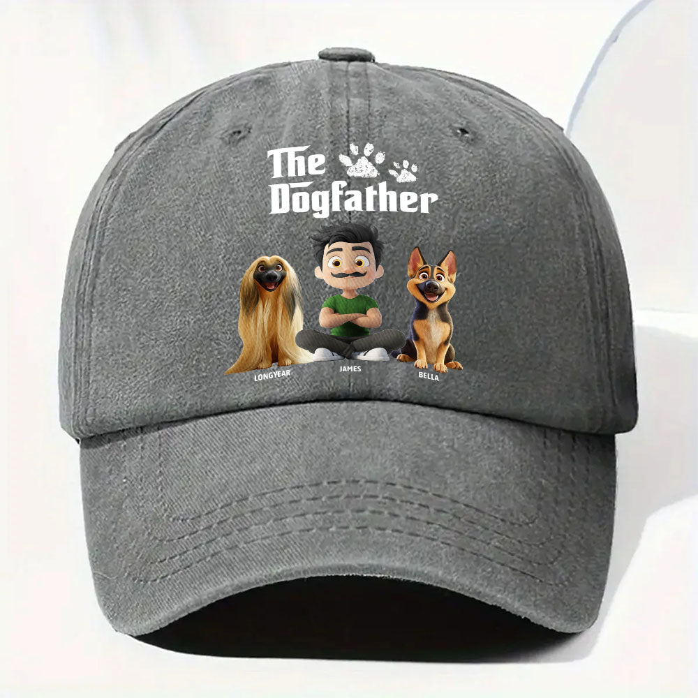 A dark gray baseball cap featuring a custom printed graphic with the text 'The Dogfather' and cartoon characters resembling Doghouse, Mutt, and Ruffwear.