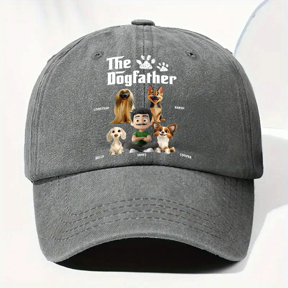 A dark gray baseball cap featuring a custom printed graphic on the front with the text 'The Dogfather' and cartoon-style illustrations of a person and several dogs, shown against a clean white background.