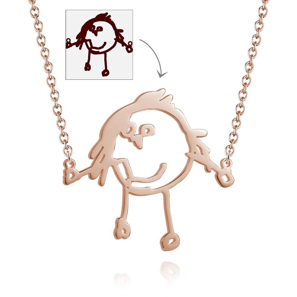 Rose gold necklace with a unique design, inspired by a child's drawing, on a white background.