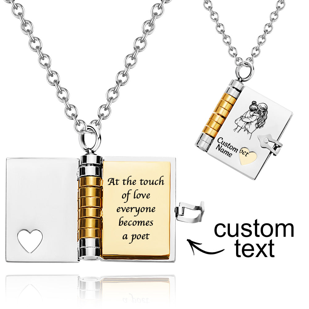 Book-shaped pendant with engraved text and heart design on a white background