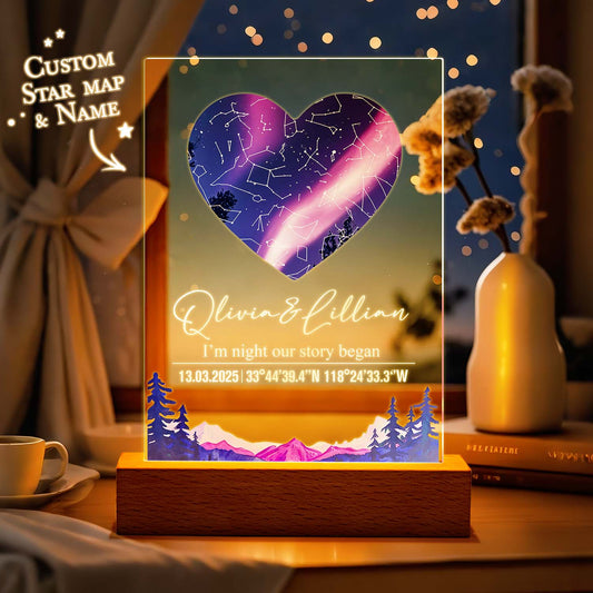 Heart-shaped custom star map with personalized name and coordinates on a wooden base.