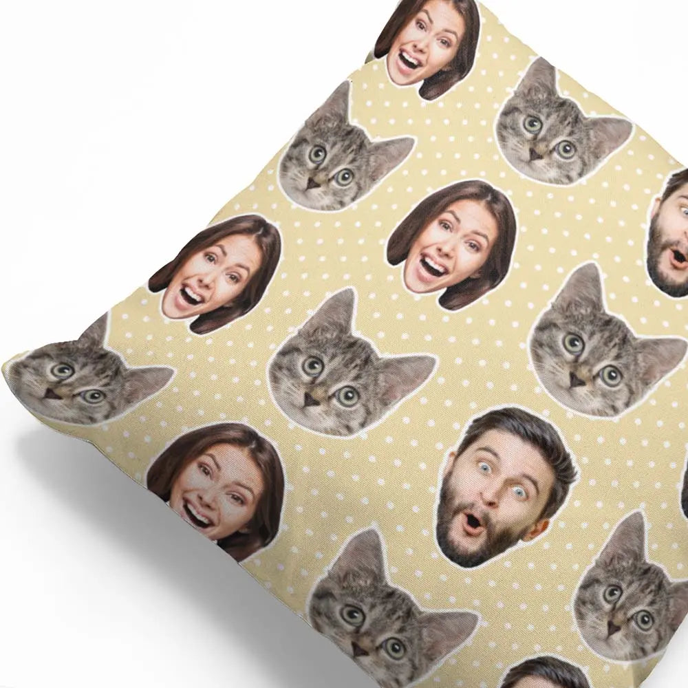 Sheet with printed faces and cat faces on a yellow polka dot background