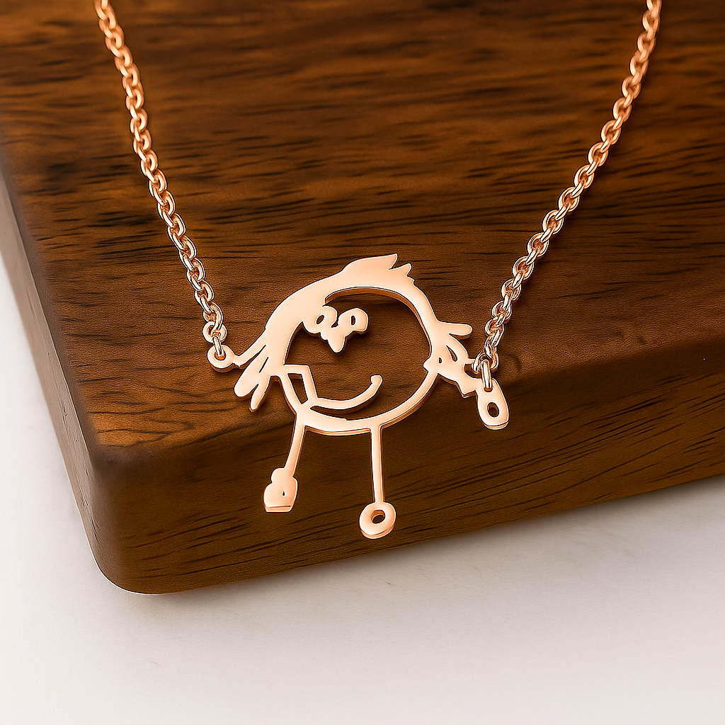 Rose gold necklace with a unique pendant on a wooden surface