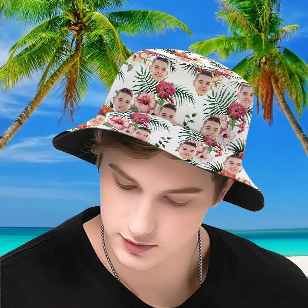 Person wearing a floral bucket hat with multiple faces on it, set against a tropical beach background.