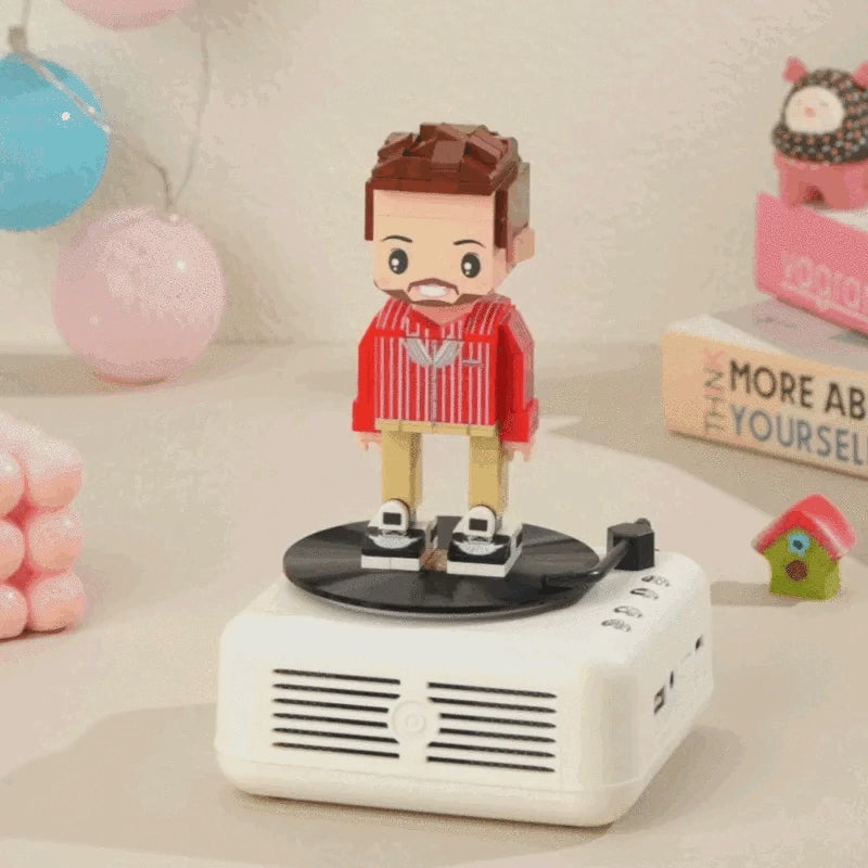 Rercord player with customised figure of a person.