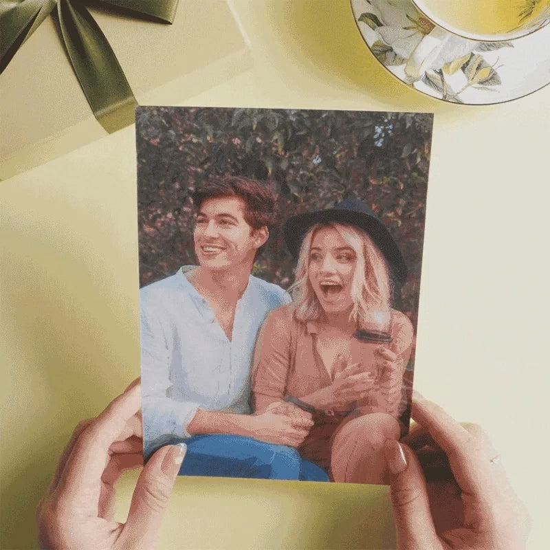 lenticular prints of real-life and animated picture of a couple.
